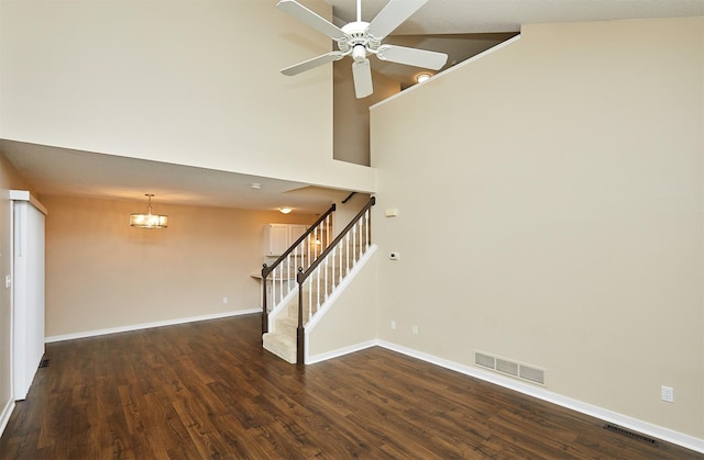 1050 68th St Unit 8, West Des Moines, IA 50266 - unfurnished living room featuring wood finished floors, stairway, a ceiling fan, and baseboards