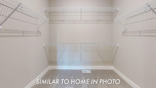 2540 E 50th Ct, Des Moines, IA 50317 - spacious closet with carpet flooring