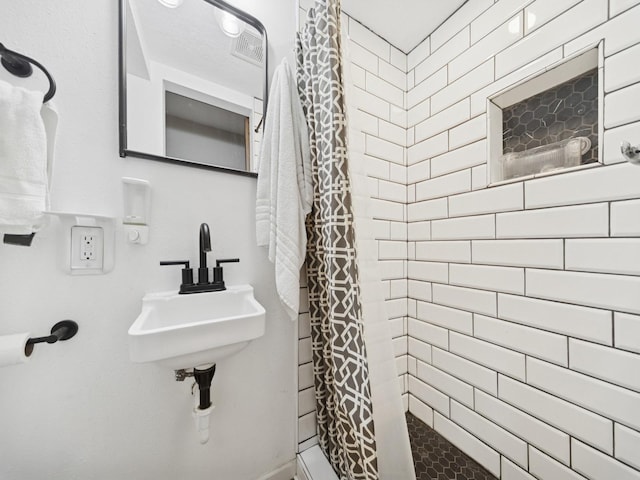 5180 NW 64th Pl, Johnston, IA 50131 - bathroom with a stall shower and a sink