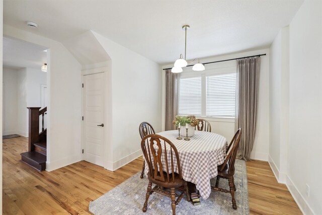 1107 24th St, Des Moines, IA 50311 - dining area featuring light wood-style floors and baseboards