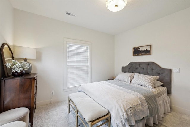 1107 24th St, Des Moines, IA 50311 - carpeted bedroom with baseboards