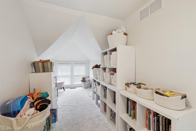 1107 24th St, Des Moines, IA 50311 - rec room with carpet flooring and vaulted ceiling
