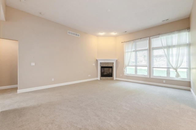 1960 NW 126th St, Clive, IA 50325 - unfurnished living room with carpet flooring, a premium fireplace, and baseboards