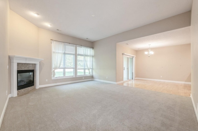1960 NW 126th St, Clive, IA 50325 - unfurnished living room with carpet floors, a chandelier, a tile fireplace, and baseboards