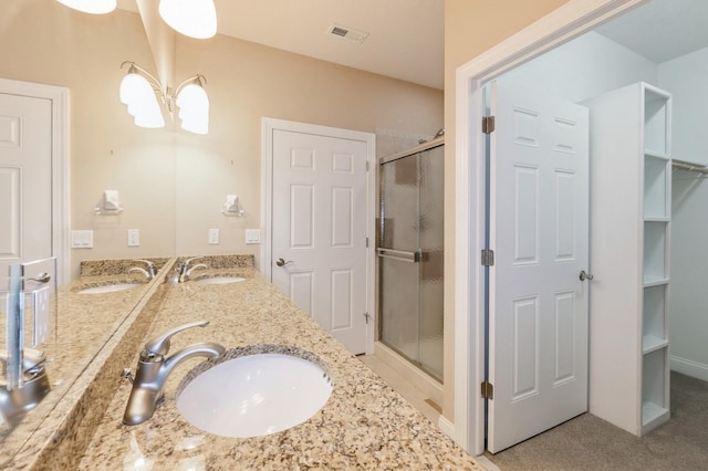 1960 NW 126th St, Clive, IA 50325 - bathroom with a shower stall and double vanity