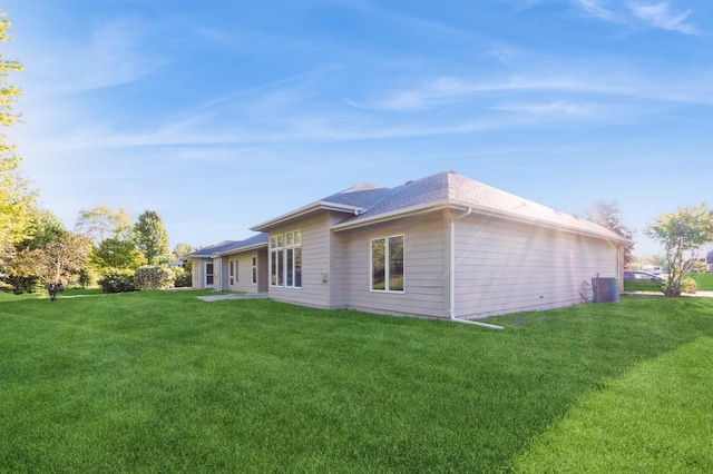 1960 NW 126th St, Clive, IA 50325 - back of house featuring a lawn and central AC unit