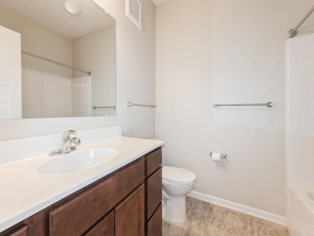 1250 SW Magazine Rd Unit 105, Ankeny, IA 50023 - bathroom with vanity, toilet, baseboards, and bathing tub / shower combination