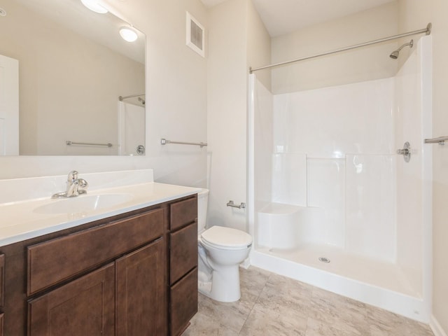 1250 SW Magazine Rd Unit 105, Ankeny, IA 50023 - full bathroom featuring vanity, toilet, and a shower