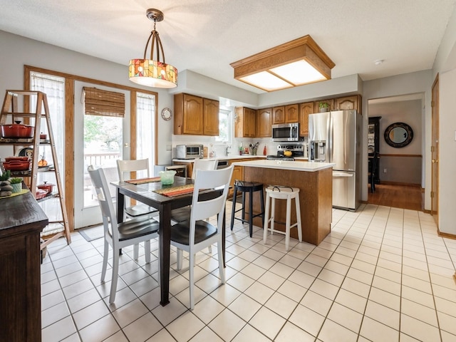 2190 NW 147th St, Clive, IA 50325 - dining area with light tile patterned floors