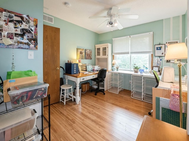 2190 NW 147th St, Clive, IA 50325 - office with light wood finished floors and a ceiling fan