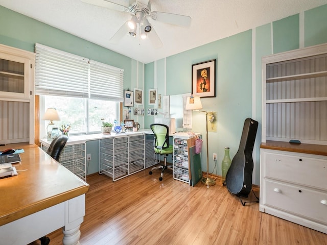 2190 NW 147th St, Clive, IA 50325 - home office with ceiling fan and light wood-style flooring