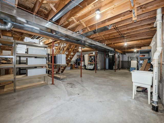2190 NW 147th St, Clive, IA 50325 - unfinished below grade area with stairway and gas water heater