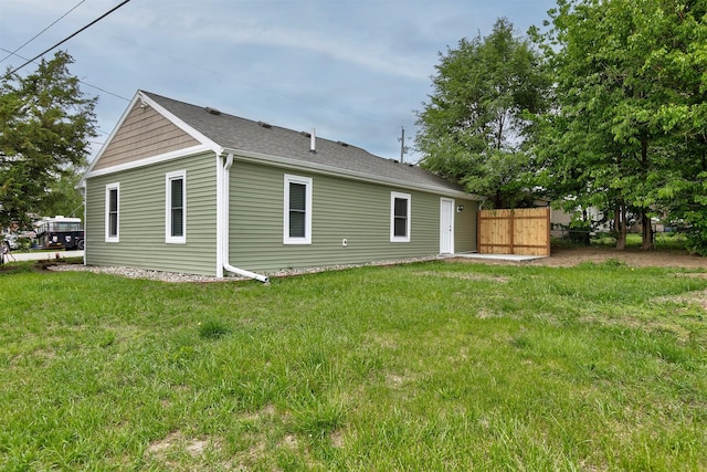 205 NW 51st Pl, Des Moines, IA 50313 - back of house featuring roof with shingles