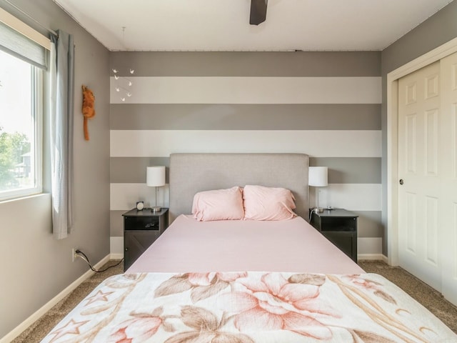 900 SE Woodbine Dr, Grimes, IA 50111 - carpeted bedroom featuring baseboards