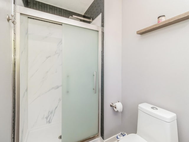 900 SE Woodbine Dr, Grimes, IA 50111 - full bath with a marble finish shower and toilet
