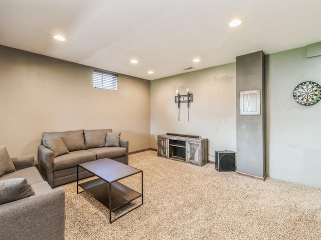 900 SE Woodbine Dr, Grimes, IA 50111 - carpeted living area featuring recessed lighting and baseboards