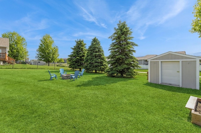 900 SE Woodbine Dr, Grimes, IA 50111 - view of yard with a fire pit