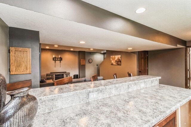 900 SE Woodbine Dr, Grimes, IA 50111 - kitchen with recessed lighting and light countertops