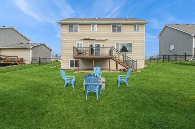 900 SE Woodbine Dr, Grimes, IA 50111 - rear view of house featuring stairs and a deck
