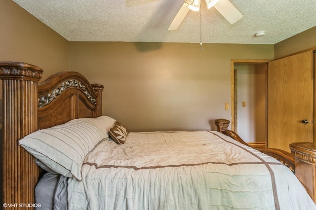 4685 E Broadway Ave, Des Moines, IA 50317 - bedroom with a textured ceiling and ceiling fan