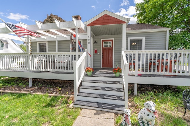 620 W Filmore St, Winterset, IA 50273 - bungalow-style house with a porch and a shingled roof