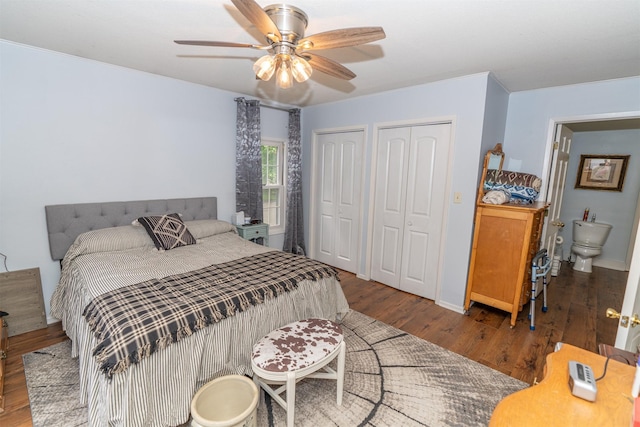 620 W Filmore St, Winterset, IA 50273 - bedroom with two closets, wood finished floors, a ceiling fan, and baseboards