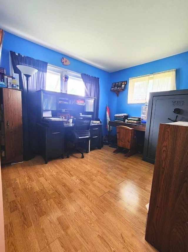1420 Court Ave, Chariton, IA 50049 - home office featuring wood finished floors