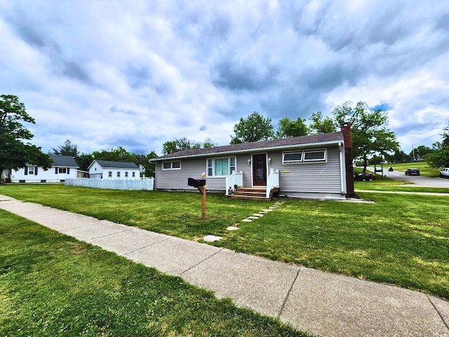 1420 Court Ave, Chariton, IA 50049 - ranch-style house with a chimney