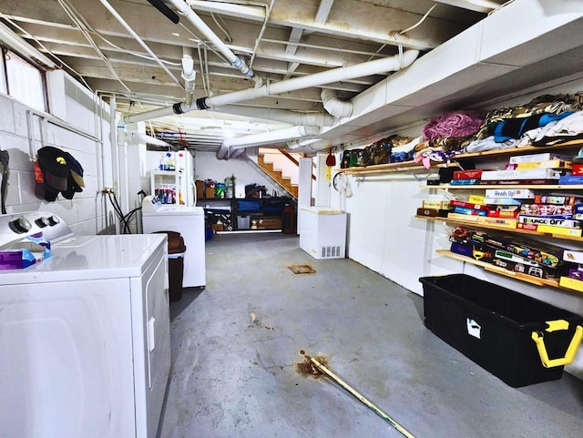 1420 Court Ave, Chariton, IA 50049 - unfinished basement featuring separate washer and dryer and stairway
