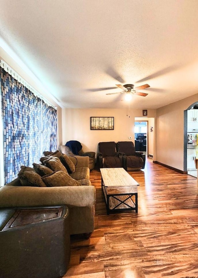 1420 Court Ave, Chariton, IA 50049 - living area with wood finished floors and ceiling fan