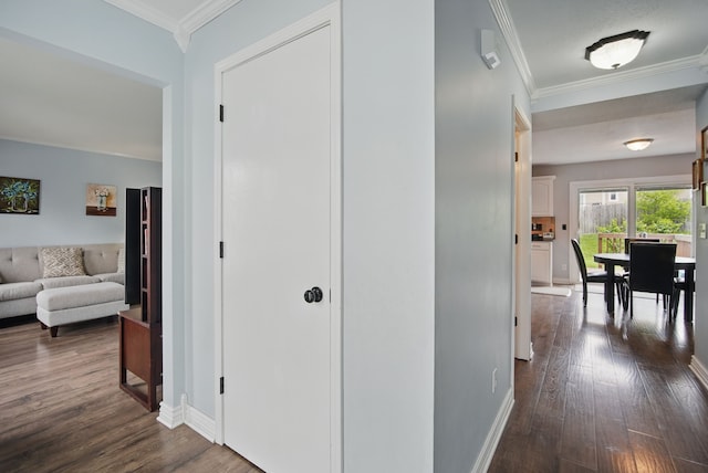 6173 Pommel Pl, West Des Moines, IA 50266 - hall with dark wood-type flooring, crown molding, and baseboards