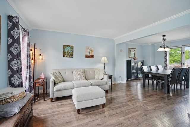 6173 Pommel Pl, West Des Moines, IA 50266 - living room with crown molding, wood finished floors, and baseboards