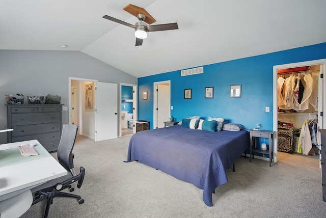 6173 Pommel Pl, West Des Moines, IA 50266 - carpeted bedroom with lofted ceiling, a walk in closet, a ceiling fan, a closet, and a desk