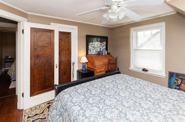 2118 34th St, Des Moines, IA 50310 - bedroom featuring wood finished floors, ornamental molding, and ceiling fan