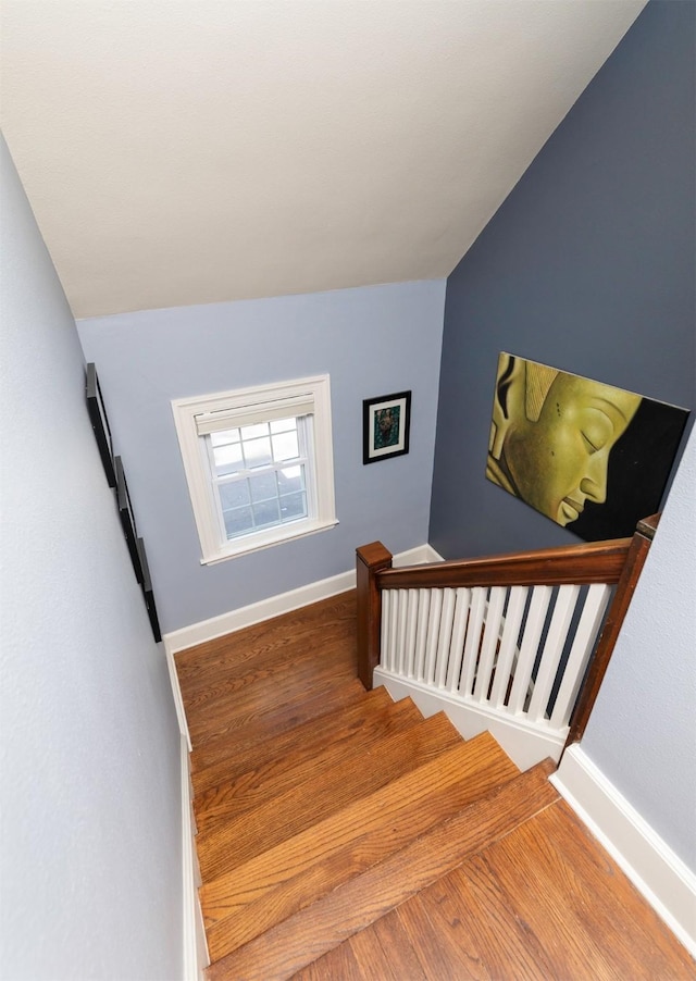 2118 34th St, Des Moines, IA 50310 - stairway with baseboards and wood finished floors