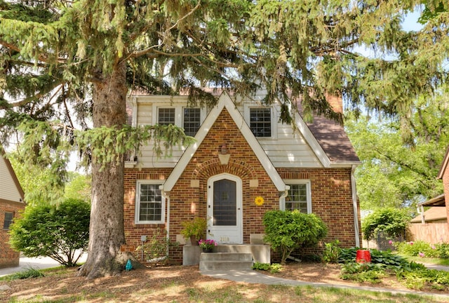 2118 34th St, Des Moines, IA 50310 - tudor home featuring brick siding