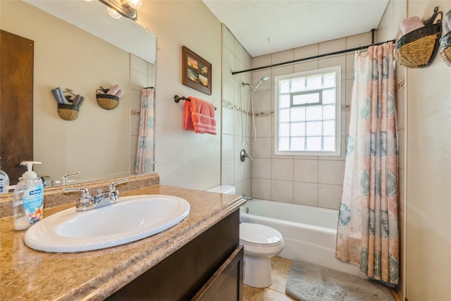 1903 W 5th Ave, Indianola, IA 50125 - full bathroom featuring vanity, toilet, shower / bathtub combination with curtain, a textured ceiling, and tile patterned flooring