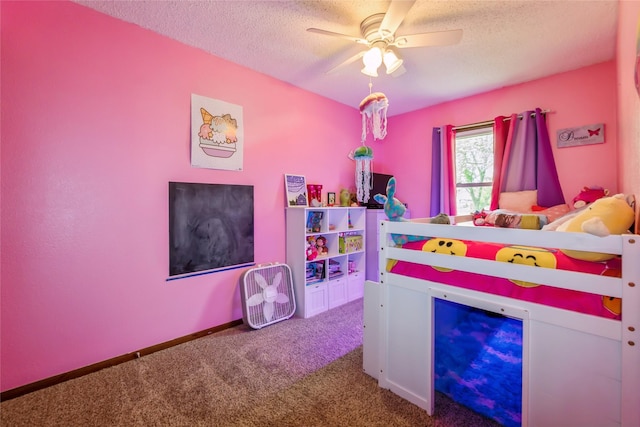 1903 W 5th Ave, Indianola, IA 50125 - bedroom featuring a textured ceiling, carpet floors, and ceiling fan