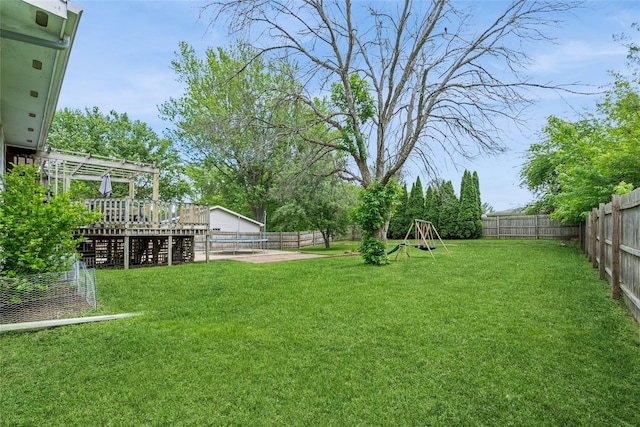 1903 W 5th Ave, Indianola, IA 50125 - view of yard with a wooden deck