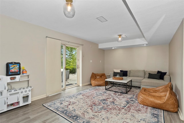 2740 Forest Dr, Des Moines, IA 50312 - living area featuring wood finished floors and baseboards