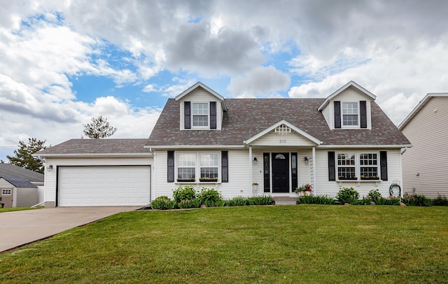 310 NE Meadowlark Ln, Waukee, IA 50263 - cape cod-style house featuring driveway, a front lawn, a garage, and roof with shingles