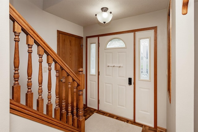 310 NE Meadowlark Ln, Waukee, IA 50263 - entrance foyer featuring stairway