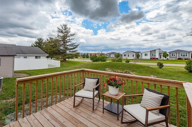 310 NE Meadowlark Ln, Waukee, IA 50263 - deck featuring a residential view and a yard