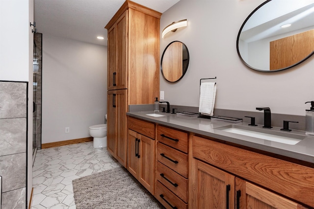 310 NE Meadowlark Ln, Waukee, IA 50263 - full bathroom with double vanity and recessed lighting