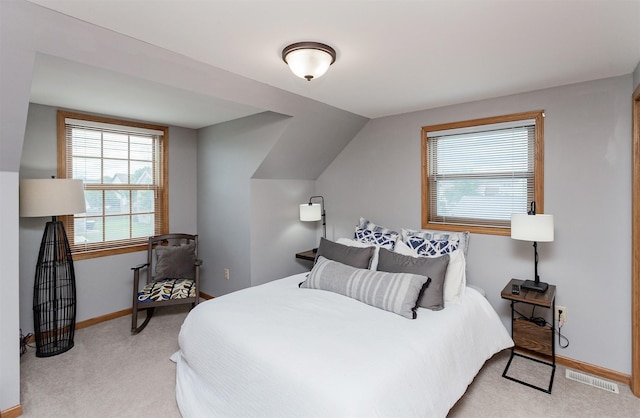 310 NE Meadowlark Ln, Waukee, IA 50263 - bedroom featuring light colored carpet and baseboards