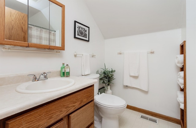 310 NE Meadowlark Ln, Waukee, IA 50263 - bathroom featuring vaulted ceiling and vanity