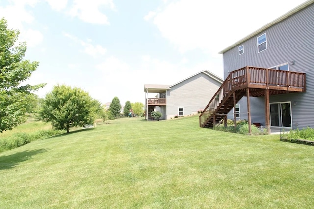 180 Bridgewood Dr, West Des Moines, IA 50266 - view of grassy yard with stairway and a deck