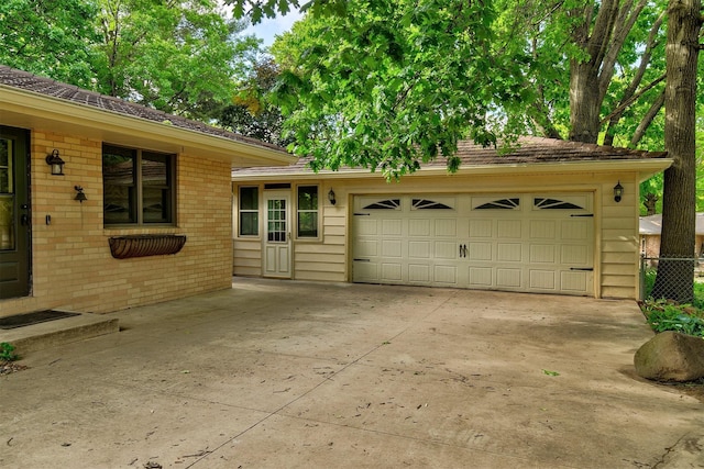 2700 Dosh Rd, Des Moines, IA 50310 - garage with concrete driveway