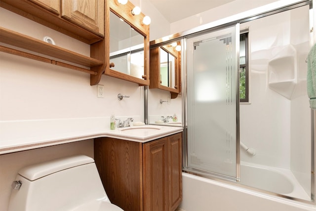 2700 Dosh Rd, Des Moines, IA 50310 - bathroom with toilet, vanity, and enclosed tub / shower combo
