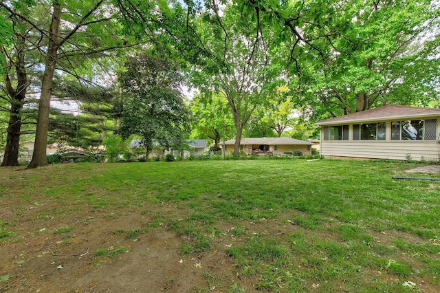 2700 Dosh Rd, Des Moines, IA 50310 - view of yard featuring a sunroom